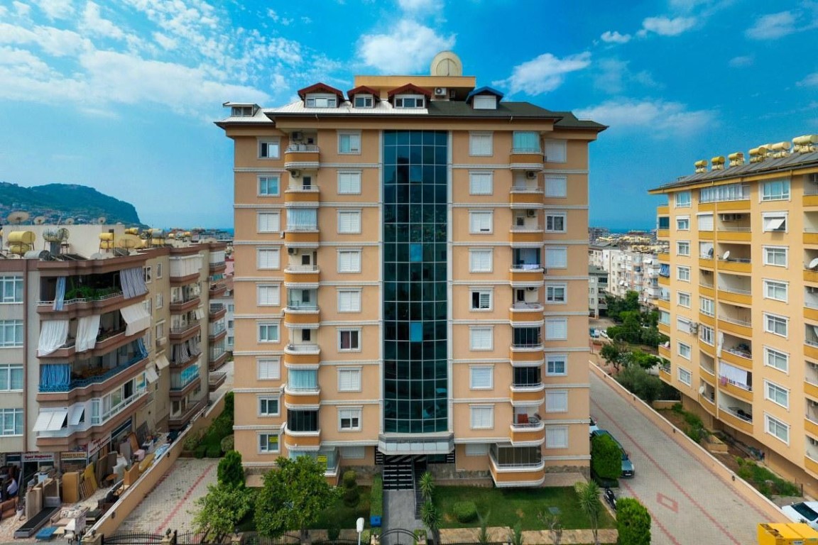 Просторная квартира 5+1 с видом на море и крепость в центре Алании. - Фото 3