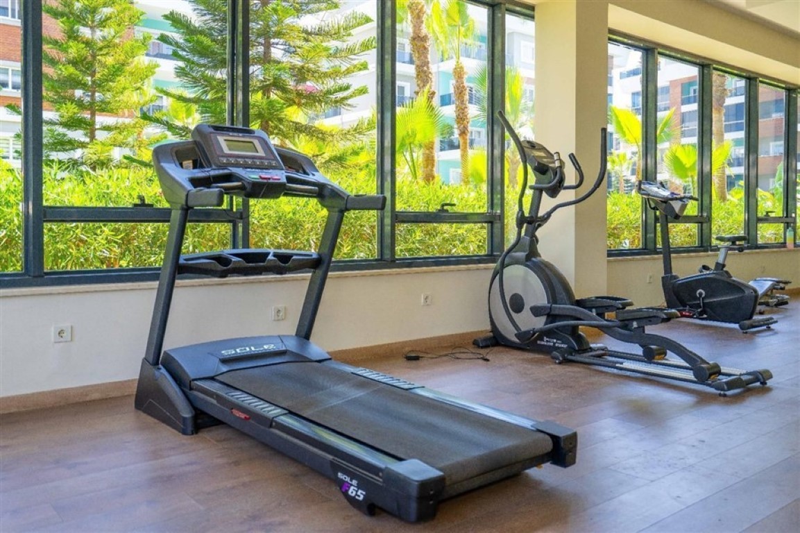 Просторные апартаменты 2+1 расположены в современном жилом комплексе района Оба. - Фото 11