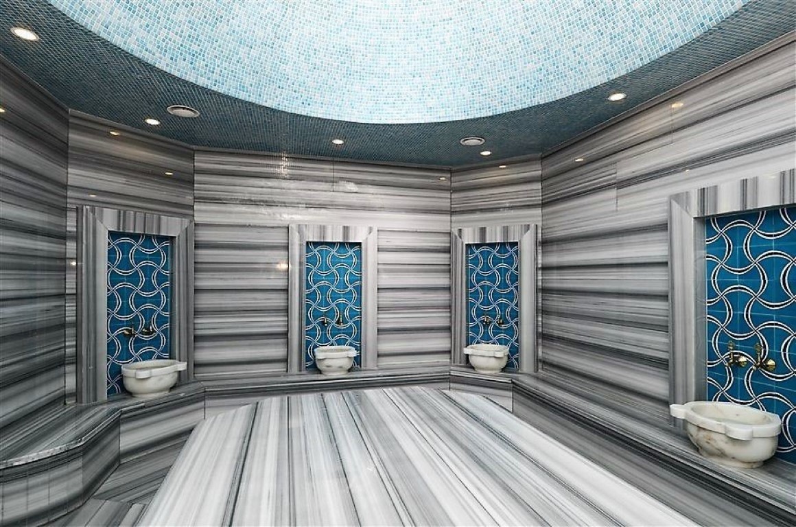 Просторные апартаменты 2+1 расположены в современном жилом комплексе района Оба. - Фото 10