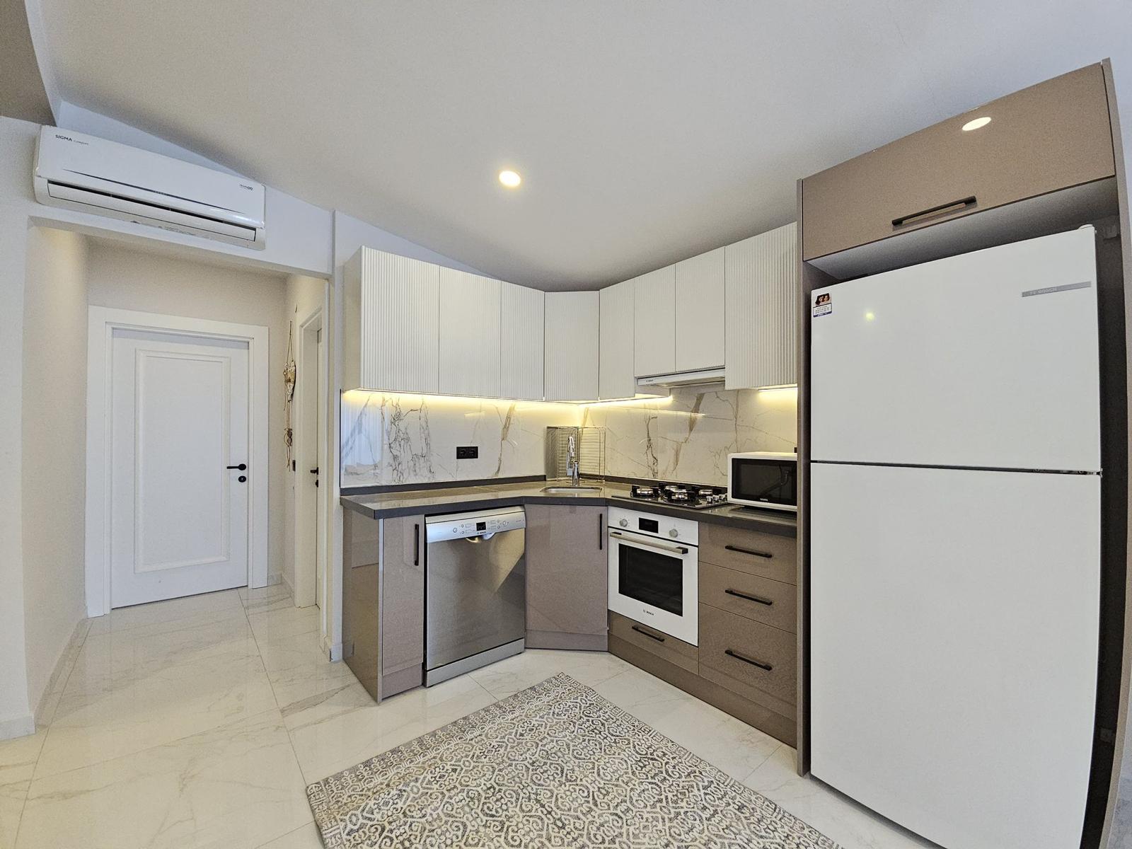 Двухуровневый пентхаус планировкой 3+1 с видом на Кале в районе пляжа Клеопатра.  - Фото 2