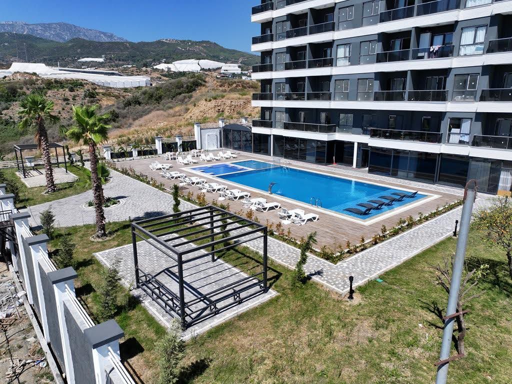 Квартира планировкой 1+1 в районе Демирташ с видом на море  - Фото 2