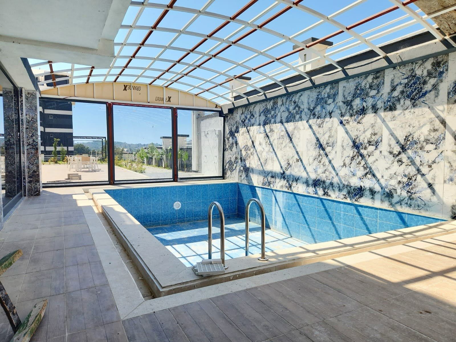 Квартира планировкой 1+1 в районе Демирташ с видом на море  - Фото 9