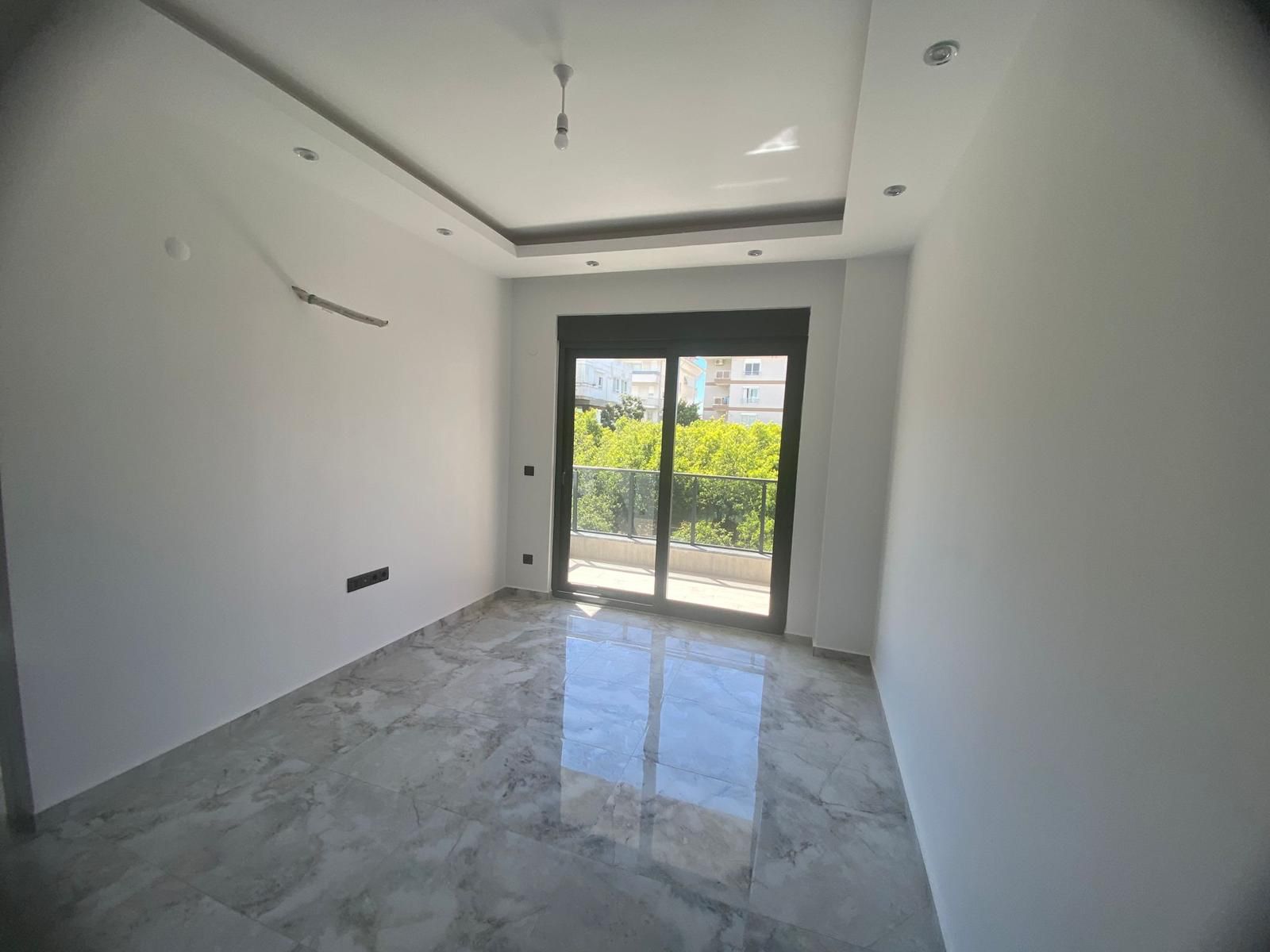 Двухкомнатная квартира без мебели в районе Оба Аланья. - Фото 11