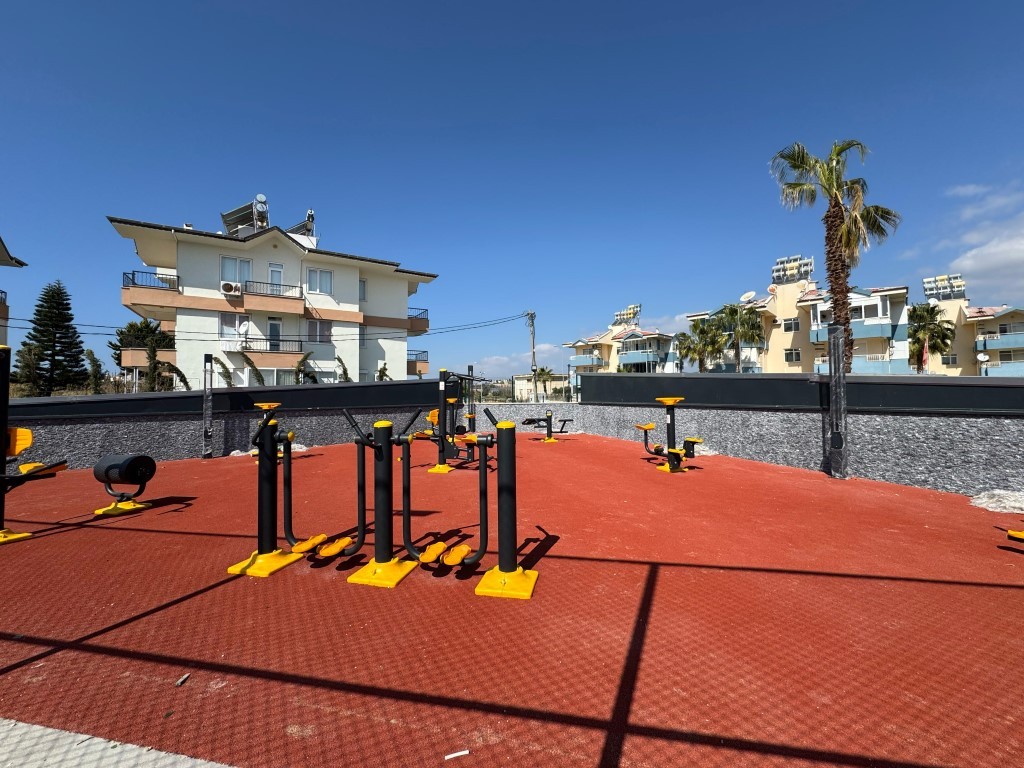 Ваш уголок рая в Тюрклере — просторные апартаменты с видом на море и инфраструктурой 5★. - Фото 58