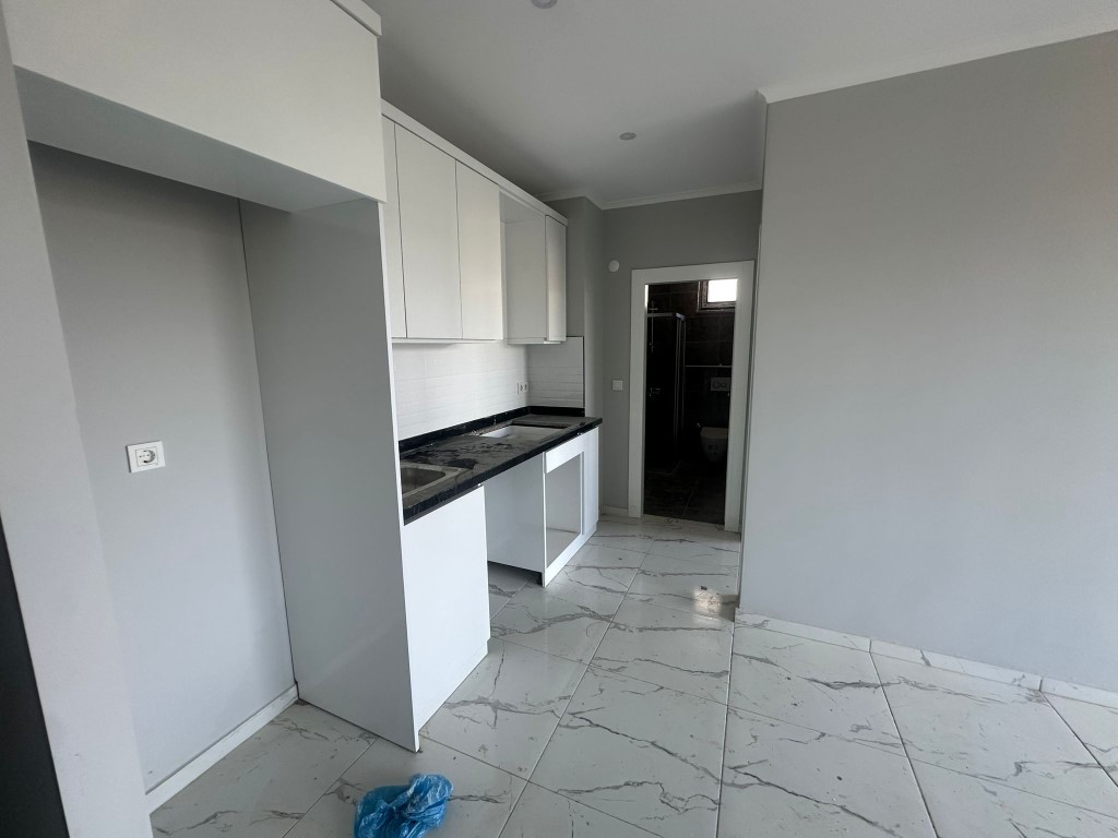 Квартира планировкой 1+1 в районе Авсаллар Аланья.  - Фото 13