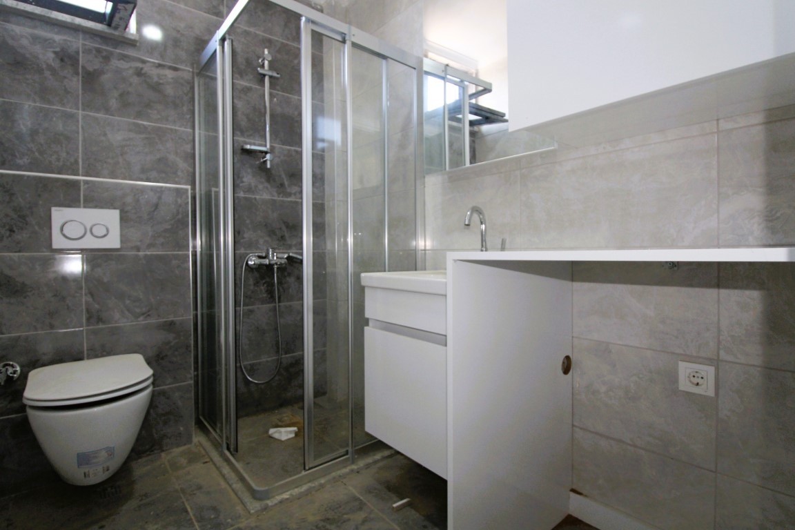 Квартира планировкой 1+1 в районе Авсаллар Аланья.  - Фото 17