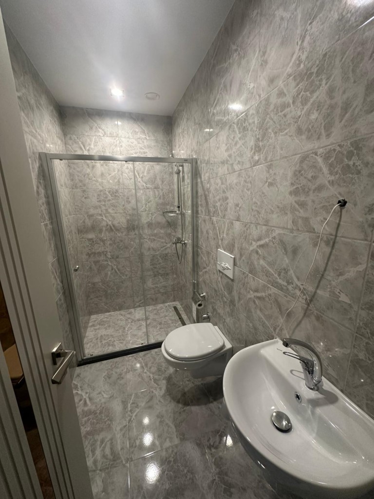 Ваш уголок рая в Тюрклере — просторные апартаменты с видом на море и инфраструктурой 5★. - Фото 15