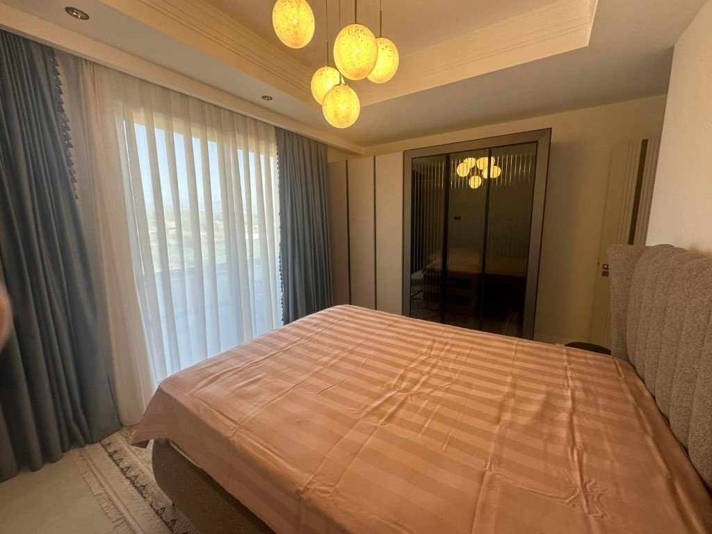 Ваш уголок рая в Тюрклере — просторные апартаменты с видом на море и инфраструктурой 5★. - Фото 11