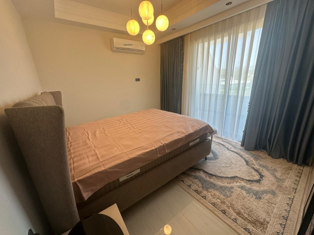 Ваш уголок рая в Тюрклере — просторные апартаменты с видом на море и инфраструктурой 5★. - Фото 12