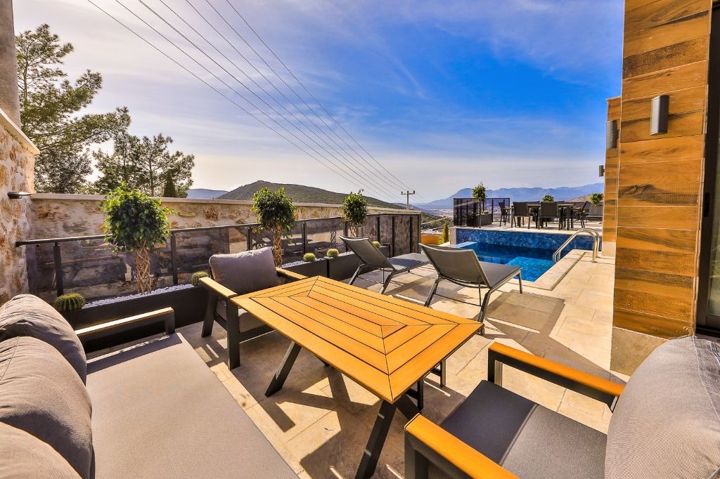 Шикарная вилла с видом на море и горы в Фетхие. - Фото 12