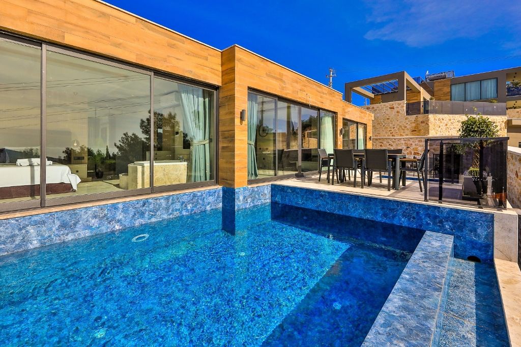 Шикарная вилла с видом на море и горы в Фетхие. - Фото 11