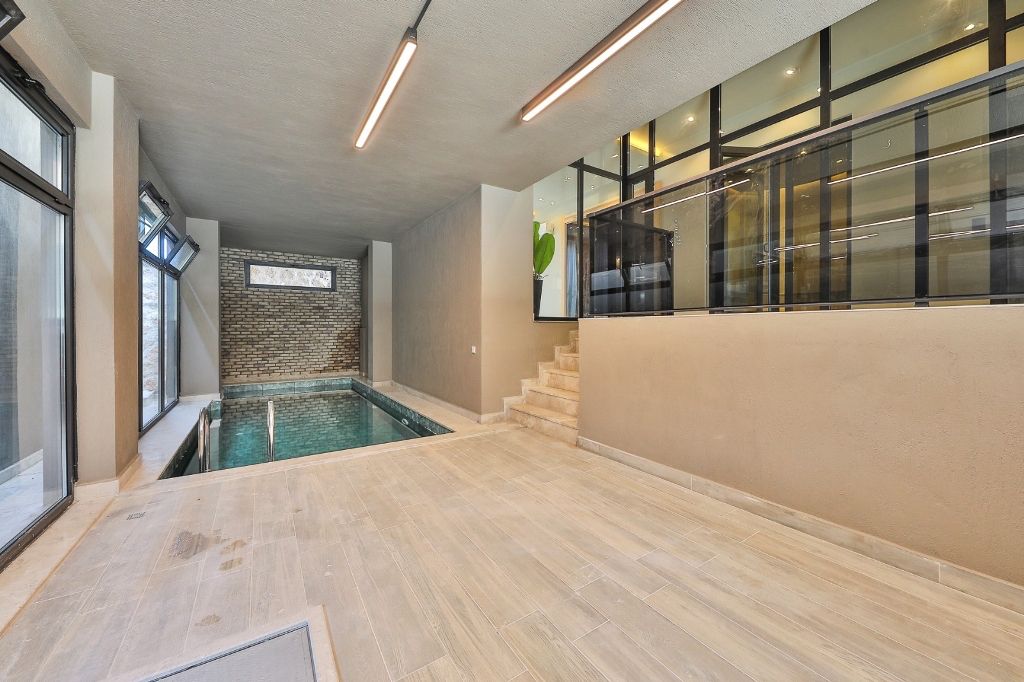 Шикарная вилла с видом на море и горы в Фетхие. - Фото 21