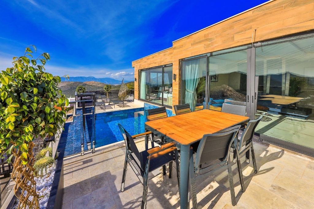 Шикарная вилла с видом на море и горы в Фетхие. - Фото 14