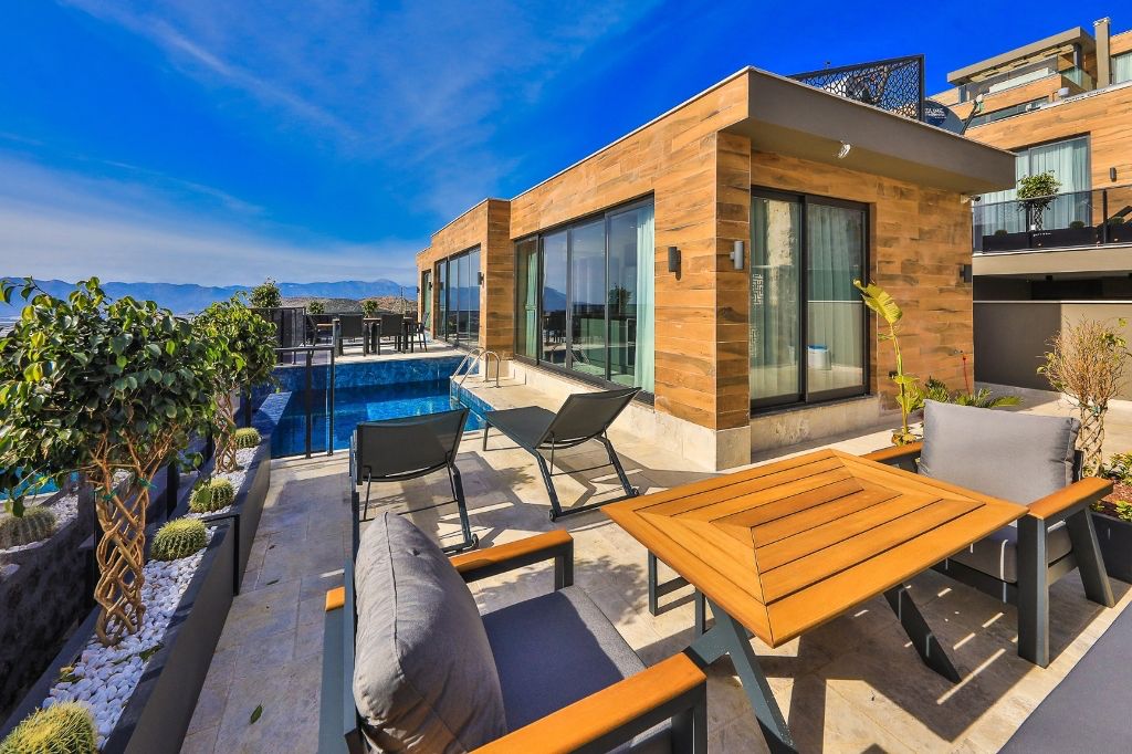 Шикарная вилла с видом на море и горы в Фетхие. - Фото 13