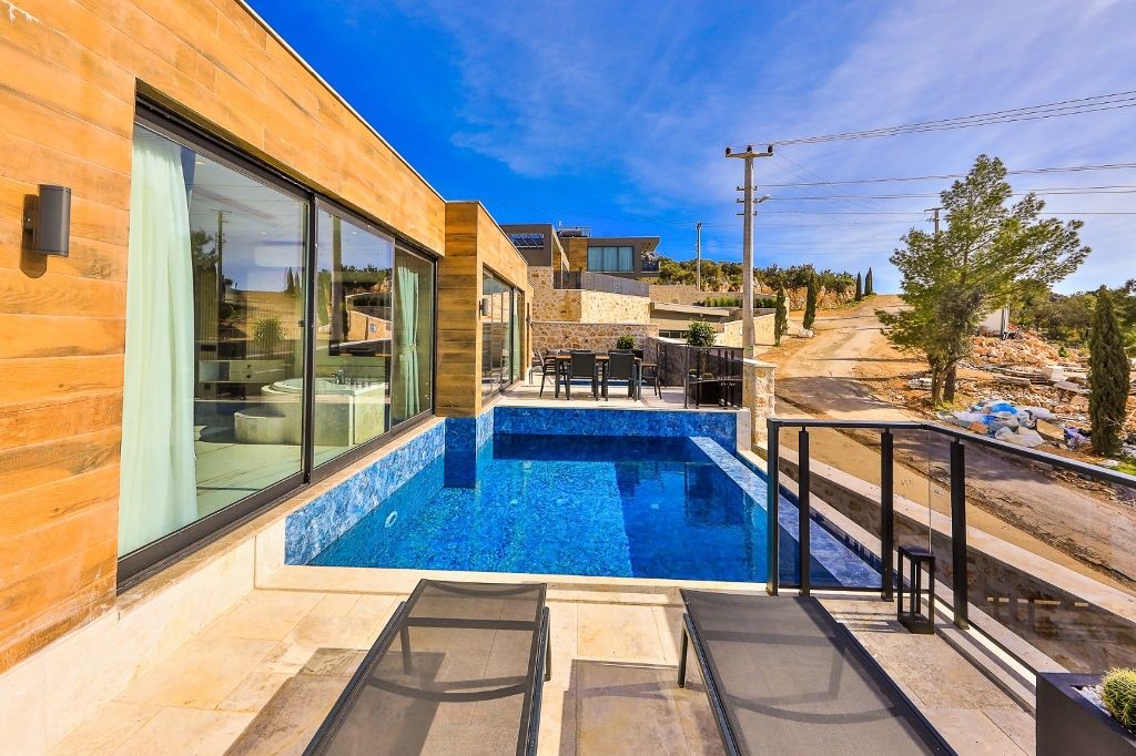 Шикарная вилла с видом на море и горы в Фетхие. - Фото 9