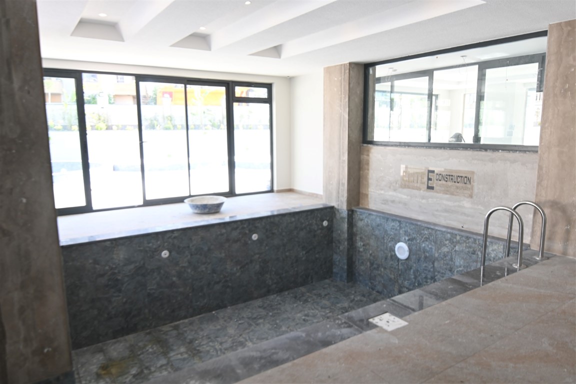 Двухкомнатная квартира в новом современном жилом комплексе района Оба Аланья.  - Фото 15