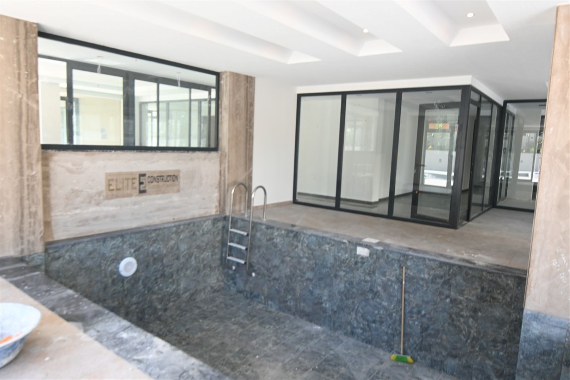 Двухкомнатная квартира в новом современном жилом комплексе района Оба Аланья.  - Фото 17