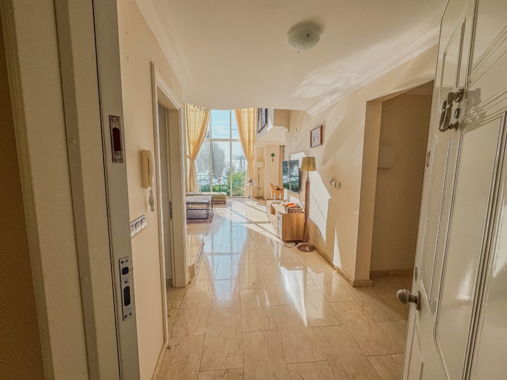 Вилла в районе Тепе Аланья с видом на море и правом на гражданство. - Фото 10