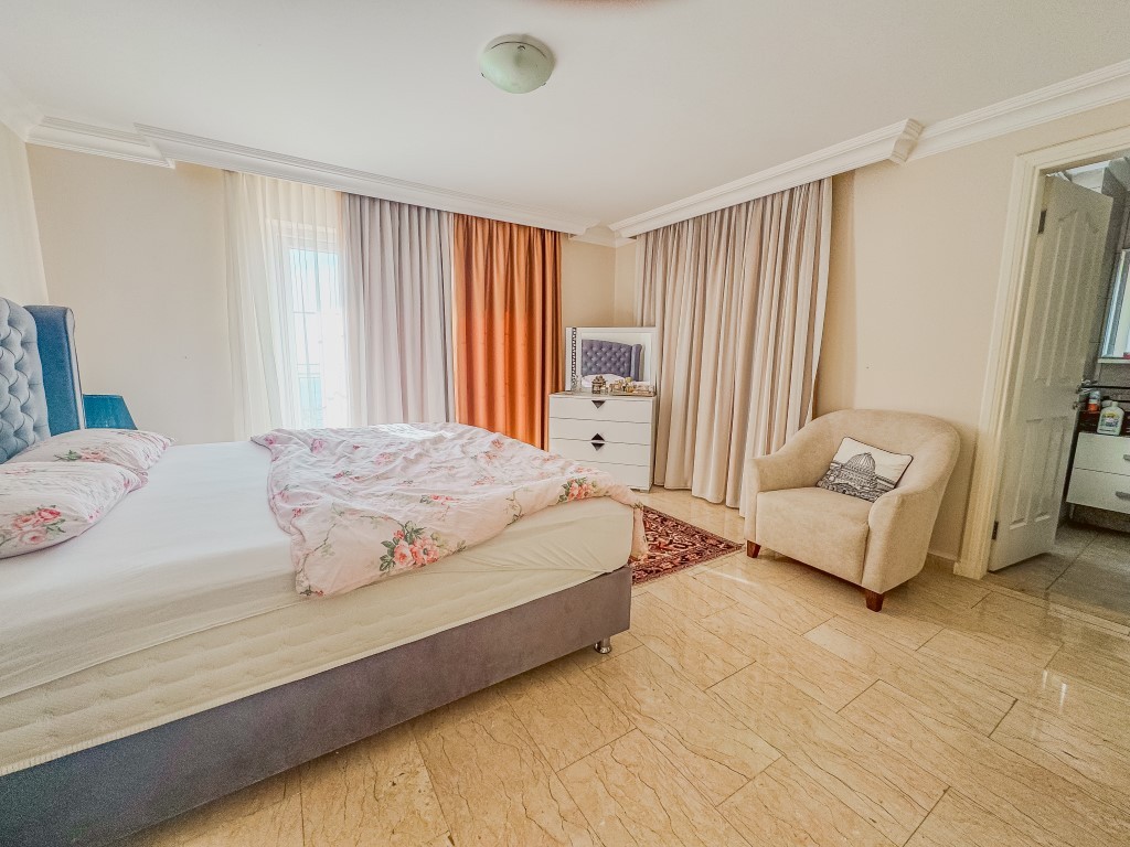 Вилла в районе Тепе Аланья с видом на море и правом на гражданство. - Фото 29