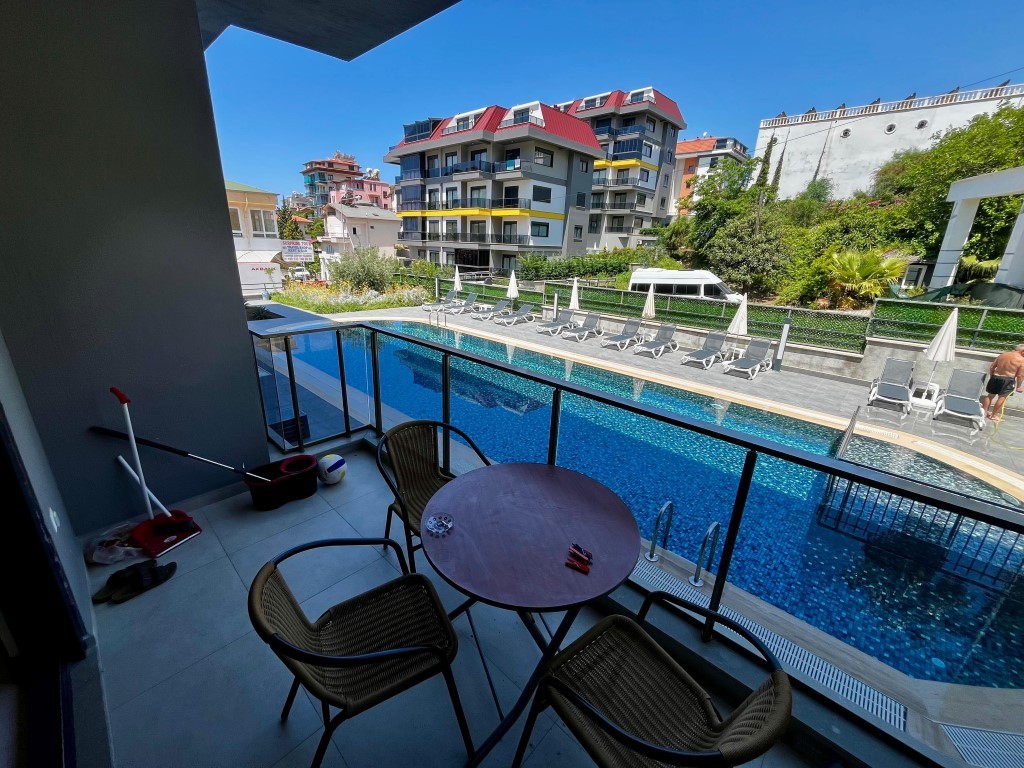 Мебилированная квартира c видом на бассейн планировкой 1+1 район Кестель Аланья.  - Фото 17