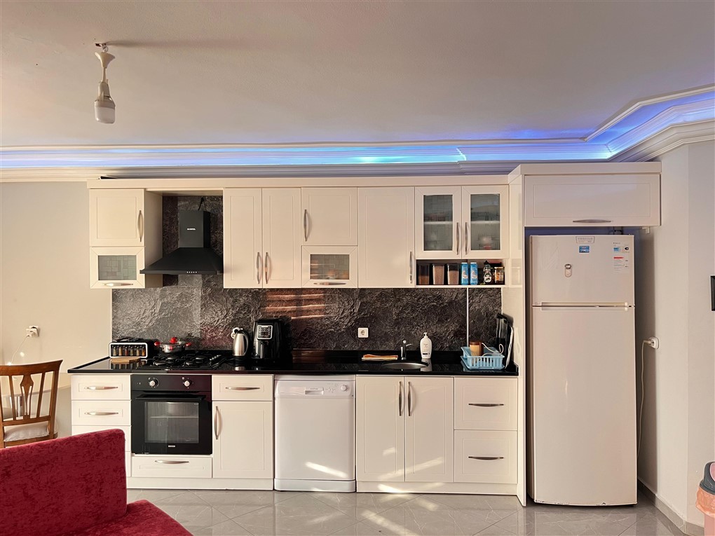 Мебилированная квартира планировкой 1+1  в 70 метрах от пляжа район Оба Аланья.  - Фото 5