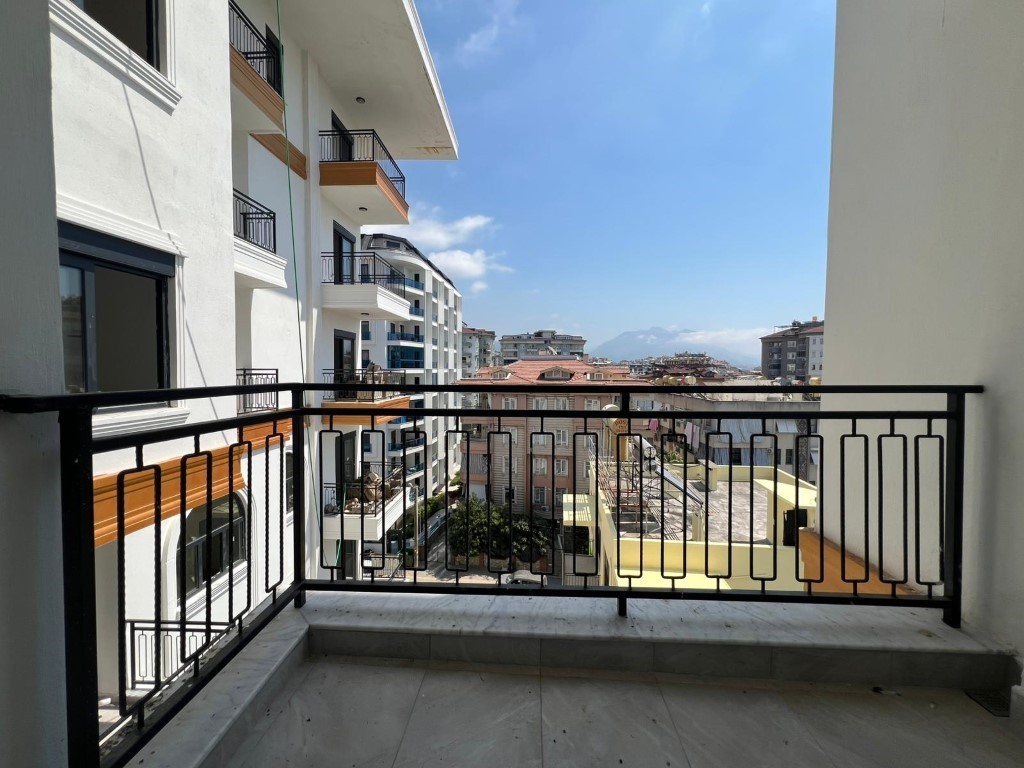 Двухкомнатная квартира в новым жилом комплекс в центре Аланьи. - Фото 12