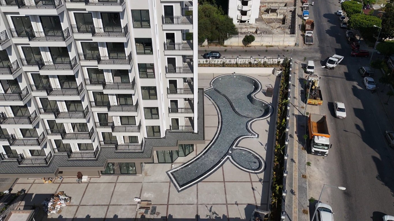 Двухкомнатная квартира в новом современном жилом комплексе района Оба Аланья.  - Фото 12