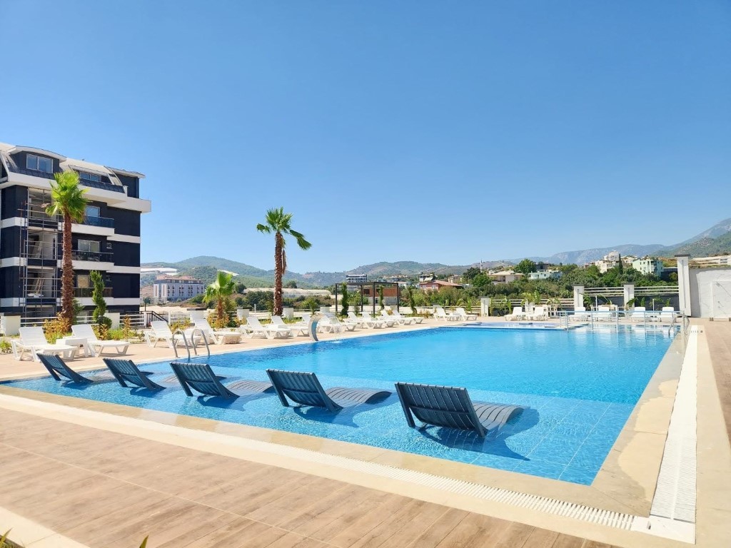  Квартиры в новом современном жилом комплексе с беспроцентной рассрочкой район Демирташ Аланья.  - Фото 11