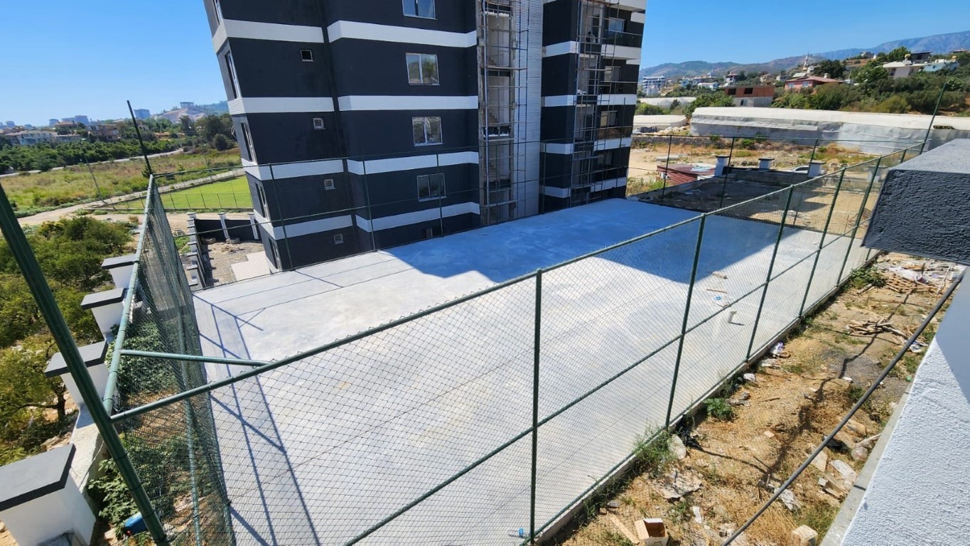  Квартиры в новом современном жилом комплексе с беспроцентной рассрочкой район Демирташ Аланья.  - Фото 16