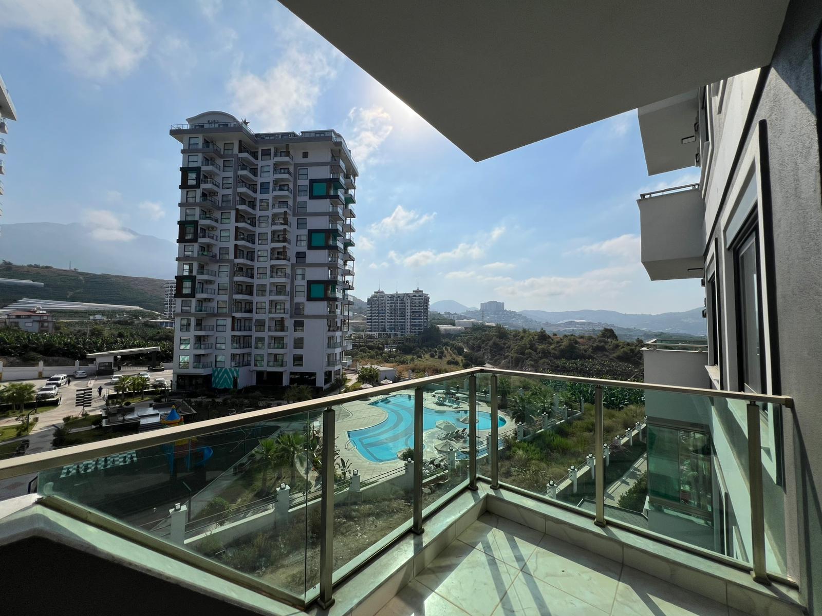 Уютная двухкомнатная квартира в живописном районе Махмутлар Алания. - Фото 21