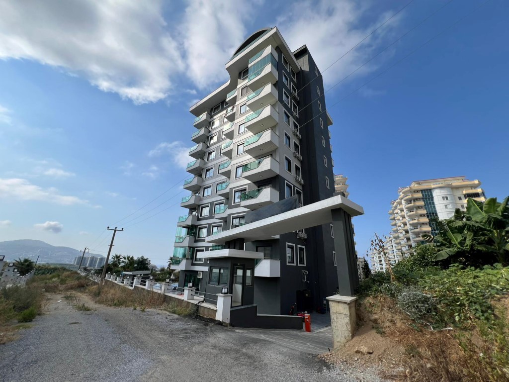 Уютная двухкомнатная квартира в живописном районе Махмутлар Алания. - Фото 3