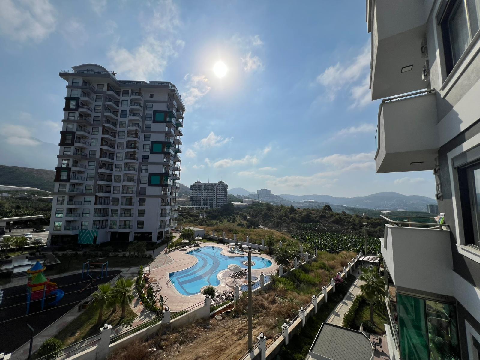 Уютная двухкомнатная квартира в живописном районе Махмутлар Алания. - Фото 22