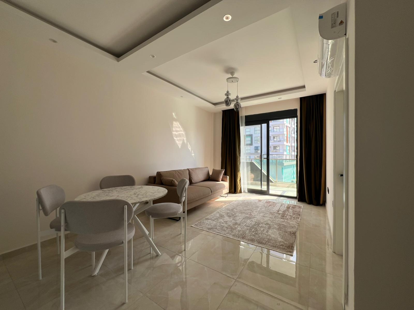 Уютная двухкомнатная квартира в живописном районе Махмутлар Алания. - Фото 19