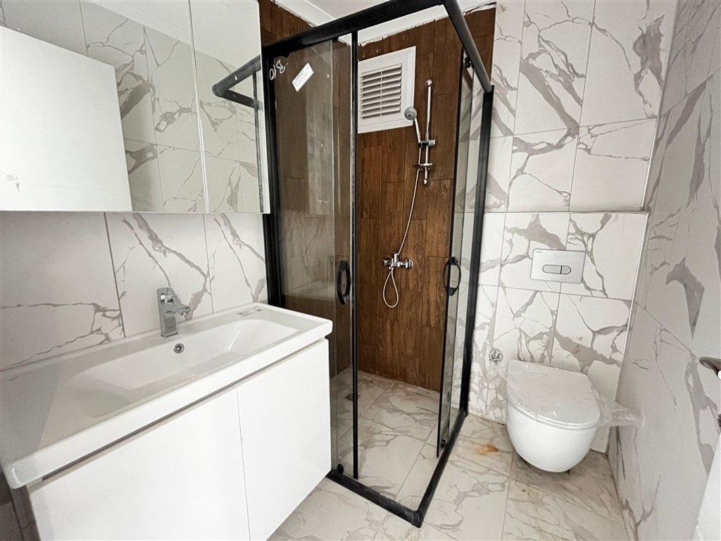 Квартира планировкой 2+1 с видом на море и город в районе Махмутлар Аланья.  - Фото 14