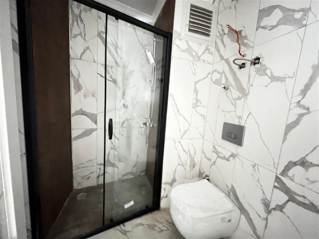 Квартира планировкой 2+1 с видом на море и город в районе Махмутлар Аланья.  - Фото 18