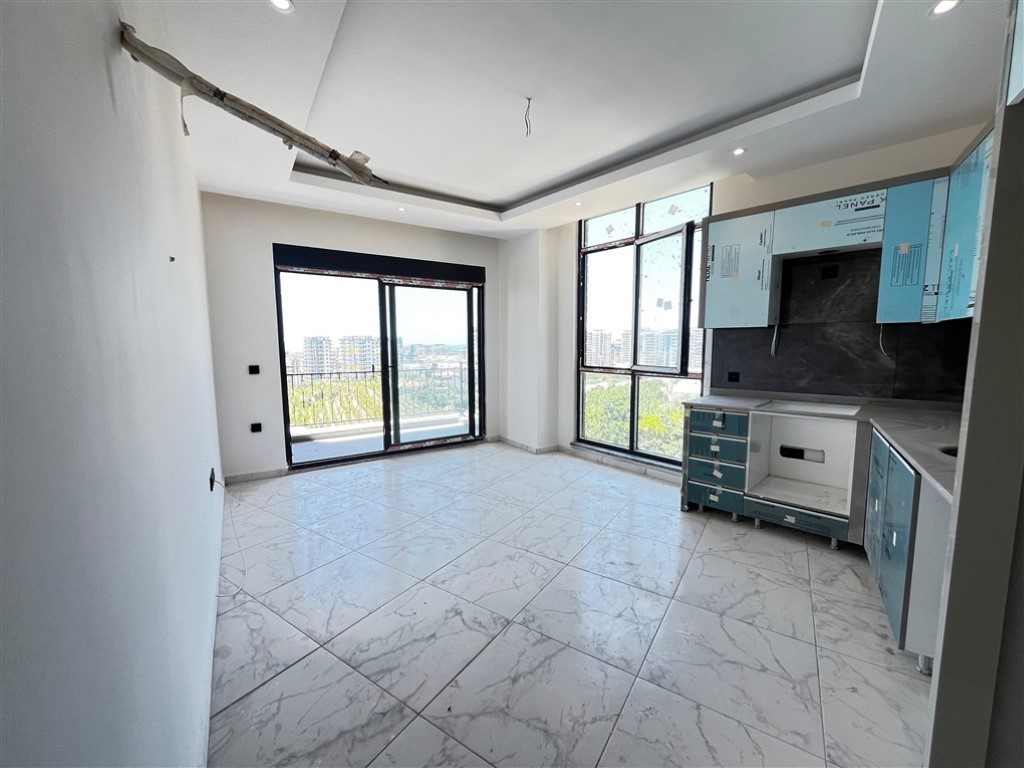 Квартира планировкой 2+1 с видом на море и город в районе Махмутлар Аланья.  - Фото 6