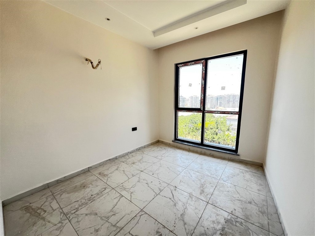 Квартира планировкой 2+1 с видом на море и город в районе Махмутлар Аланья.  - Фото 10