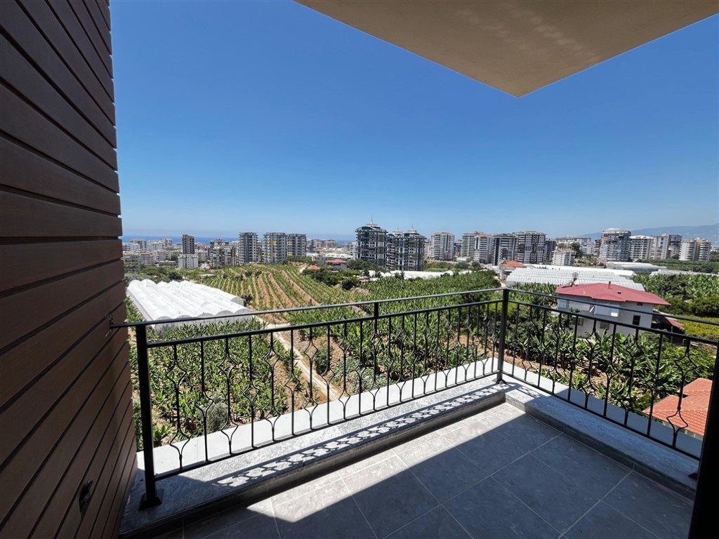 Квартира планировкой 2+1 с видом на море и город в районе Махмутлар Аланья.  - Фото 20