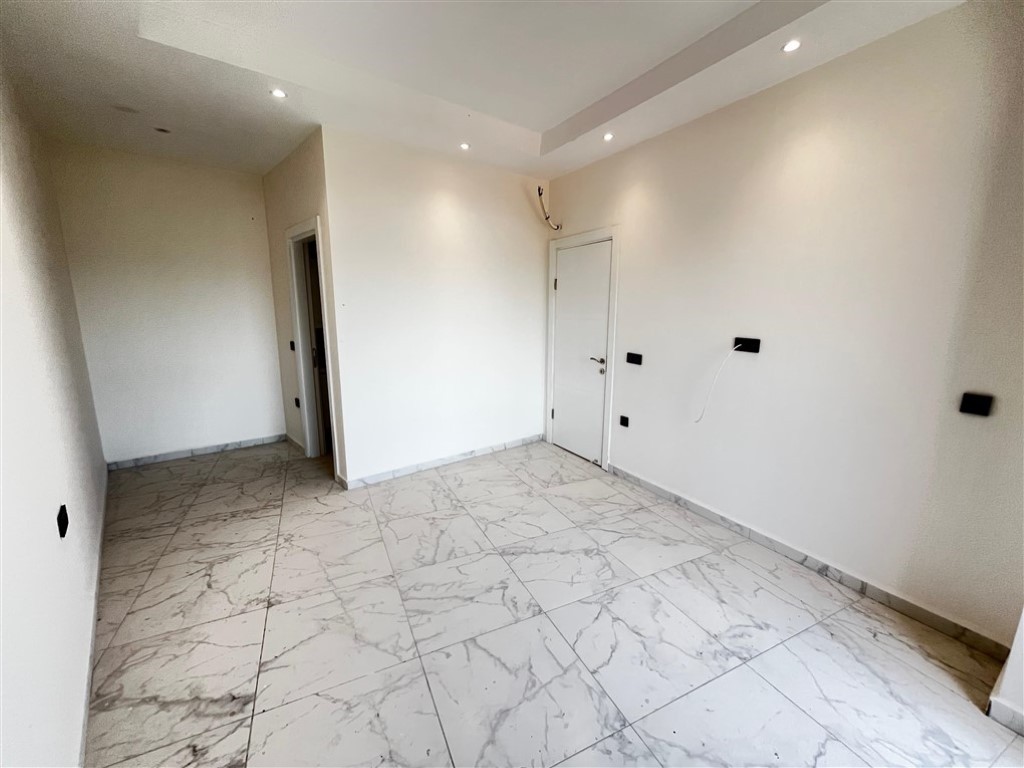 Квартира планировкой 2+1 с видом на море и город в районе Махмутлар Аланья.  - Фото 16