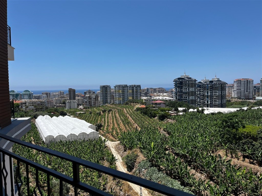 Квартира планировкой 2+1 с видом на море и город в районе Махмутлар Аланья.  - Фото 21