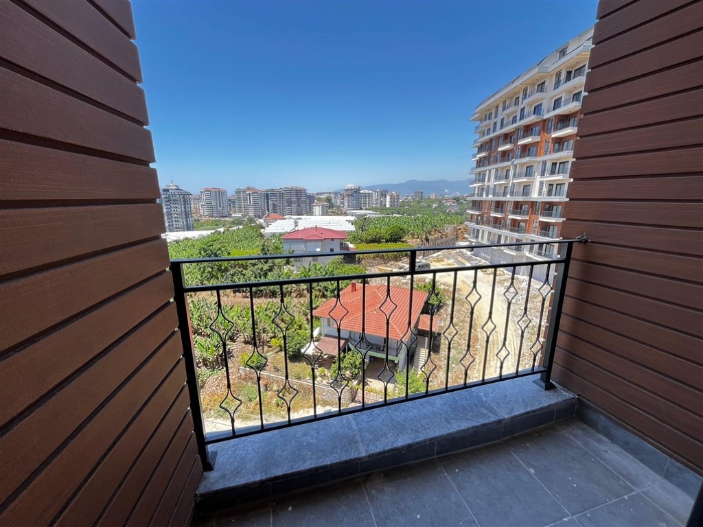 Квартира планировкой 2+1 с видом на море и город в районе Махмутлар Аланья.  - Фото 13