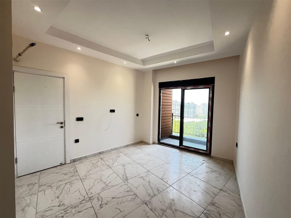 Квартира планировкой 2+1 с видом на море и город в районе Махмутлар Аланья.  - Фото 11