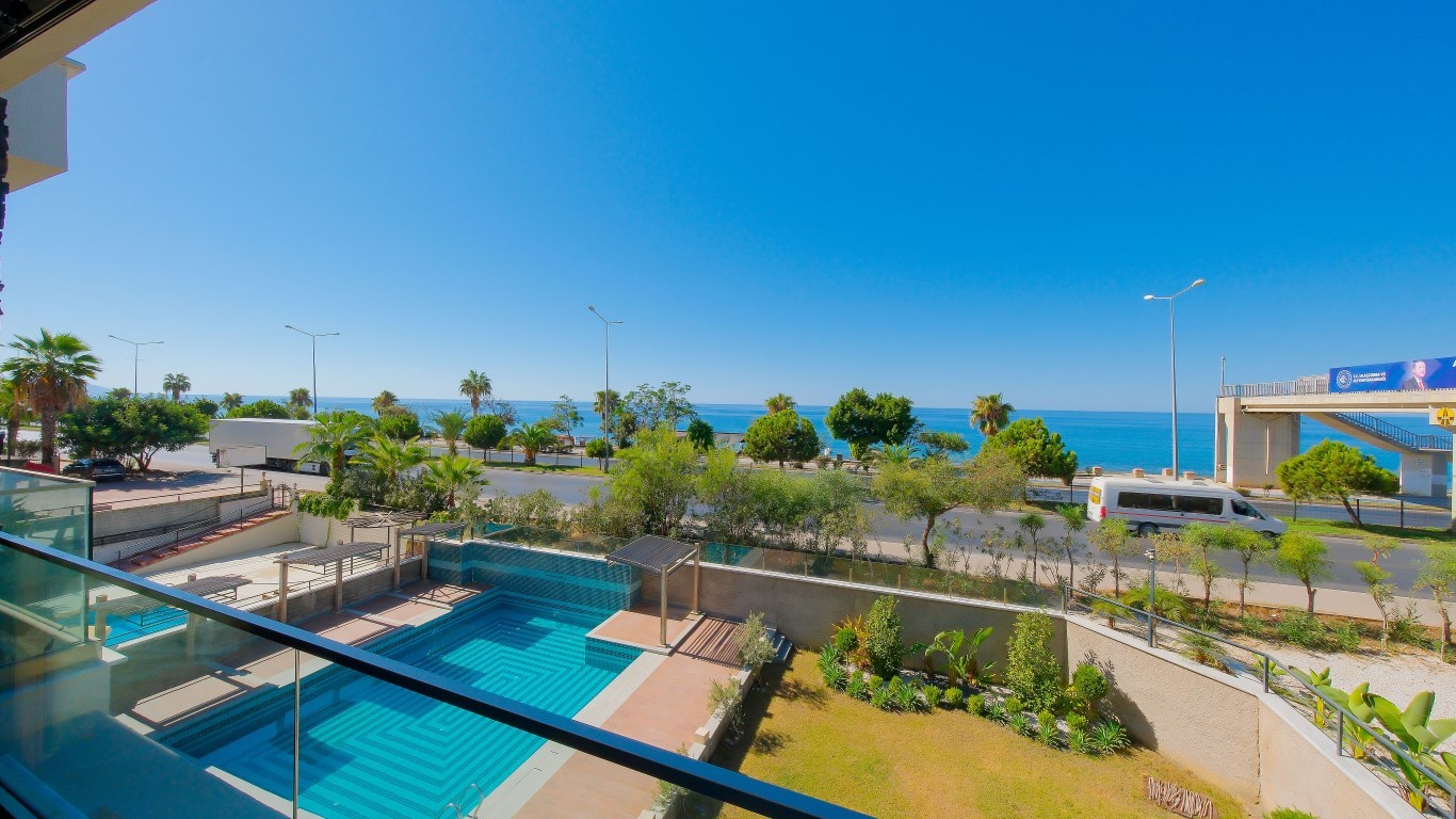 Мебелированная квартира планировкой 1+1 на первой береговой линии район Кестель Аланья.  - Фото 10