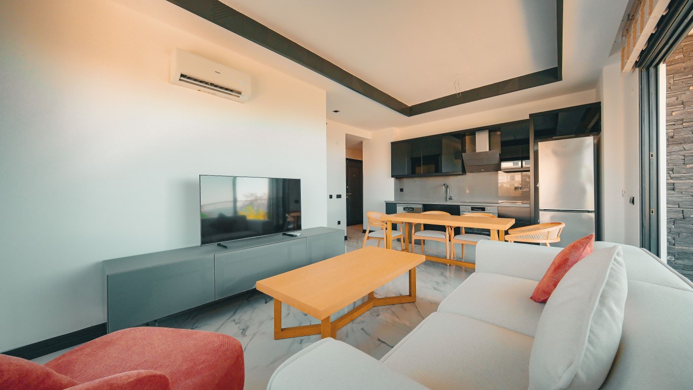 Мебелированная квартира планировкой 1+1 на первой береговой линии район Кестель Аланья.  - Фото 6