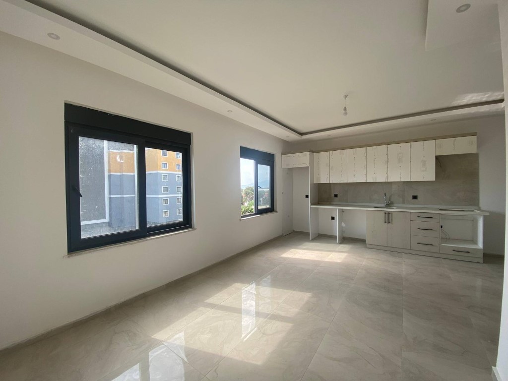 Квартира в новом комплексе планировкой 1+1 55м район Махмутлар Аланья. - Фото 9