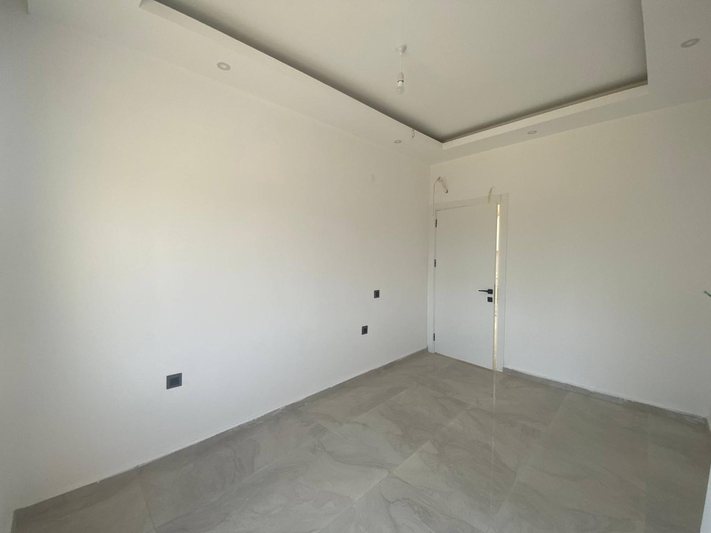 Квартира в новом комплексе планировкой 1+1 55м район Махмутлар Аланья. - Фото 14