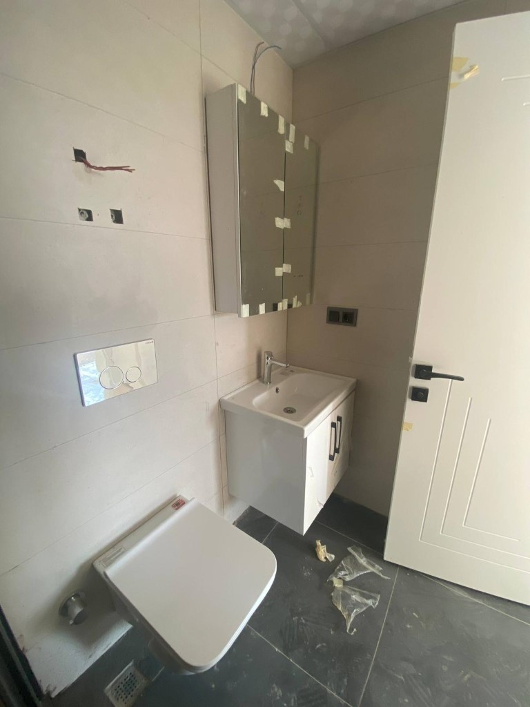 Квартира в новом комплексе планировкой 1+1 55м район Махмутлар Аланья. - Фото 17