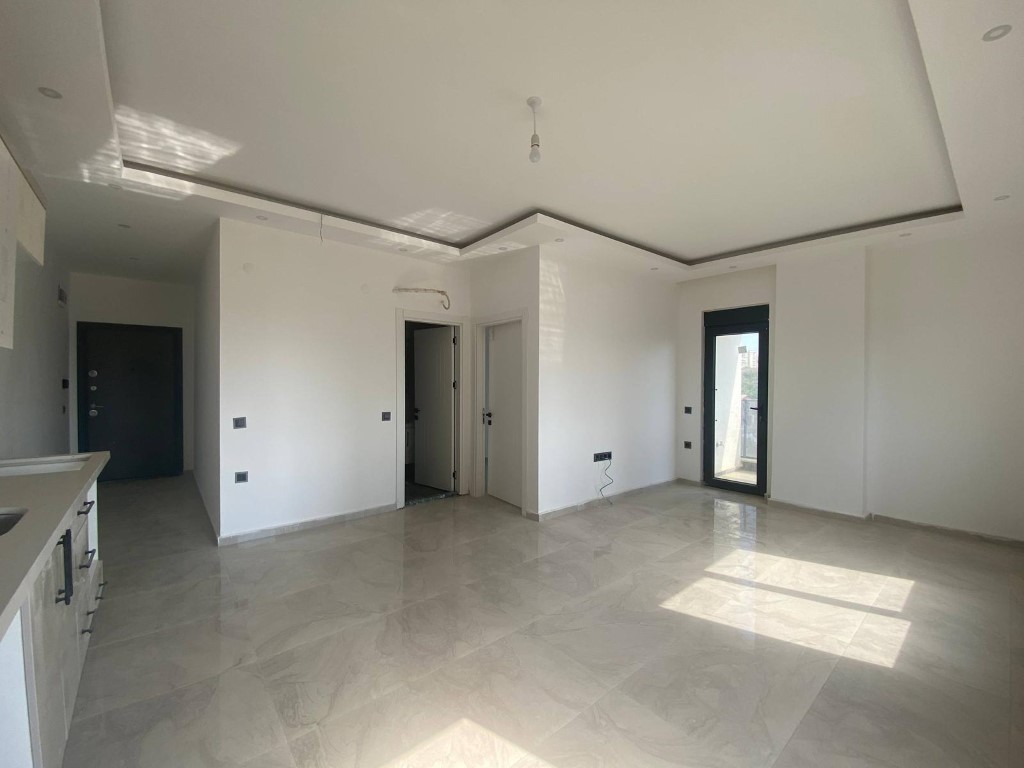 Квартира в новом комплексе планировкой 1+1 55м район Махмутлар Аланья. - Фото 11