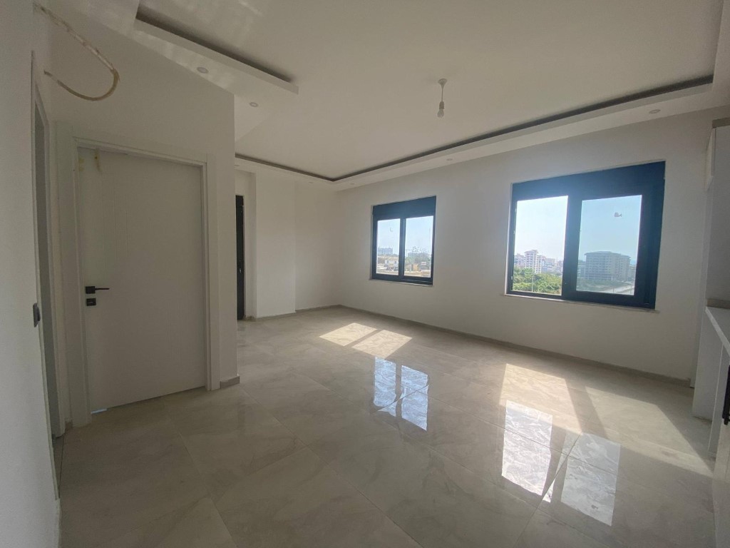 Квартира в новом комплексе планировкой 1+1 55м район Махмутлар Аланья. - Фото 12