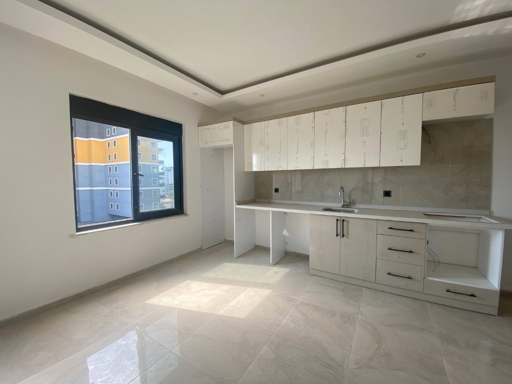 Квартира в новом комплексе планировкой 1+1 55м район Махмутлар Аланья. - Фото 10